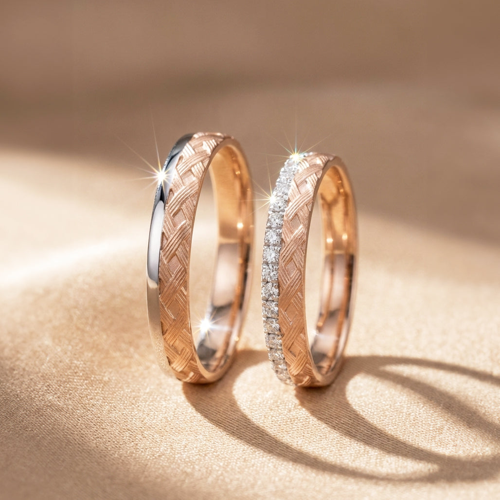 A pair of rose gold and white gold wedding band. Lady's band has pave diamond