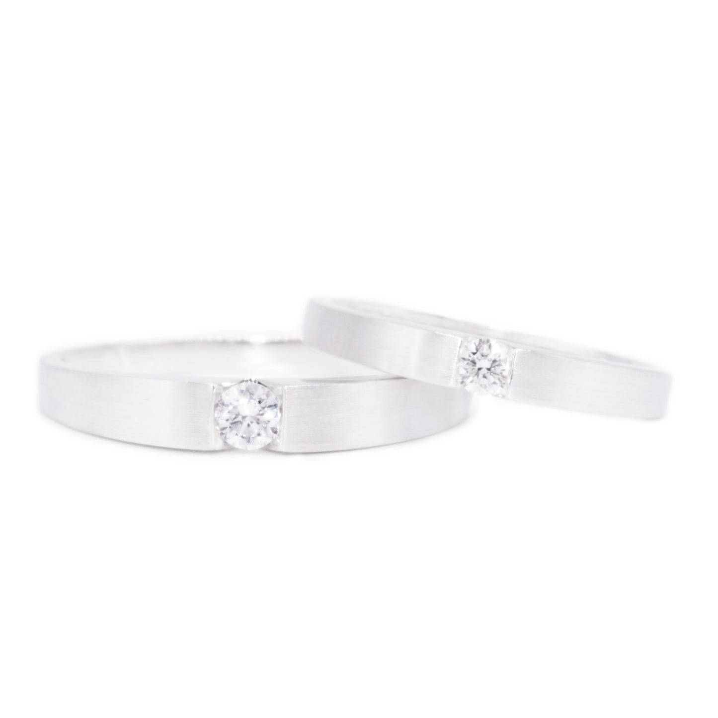 18 carat white-gold classic channel set single diamond wedding band set