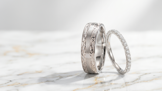 The Custom "Artisan" Wedding Bands: Intricate Engraving Meets a Diamond Eternity Silhouette