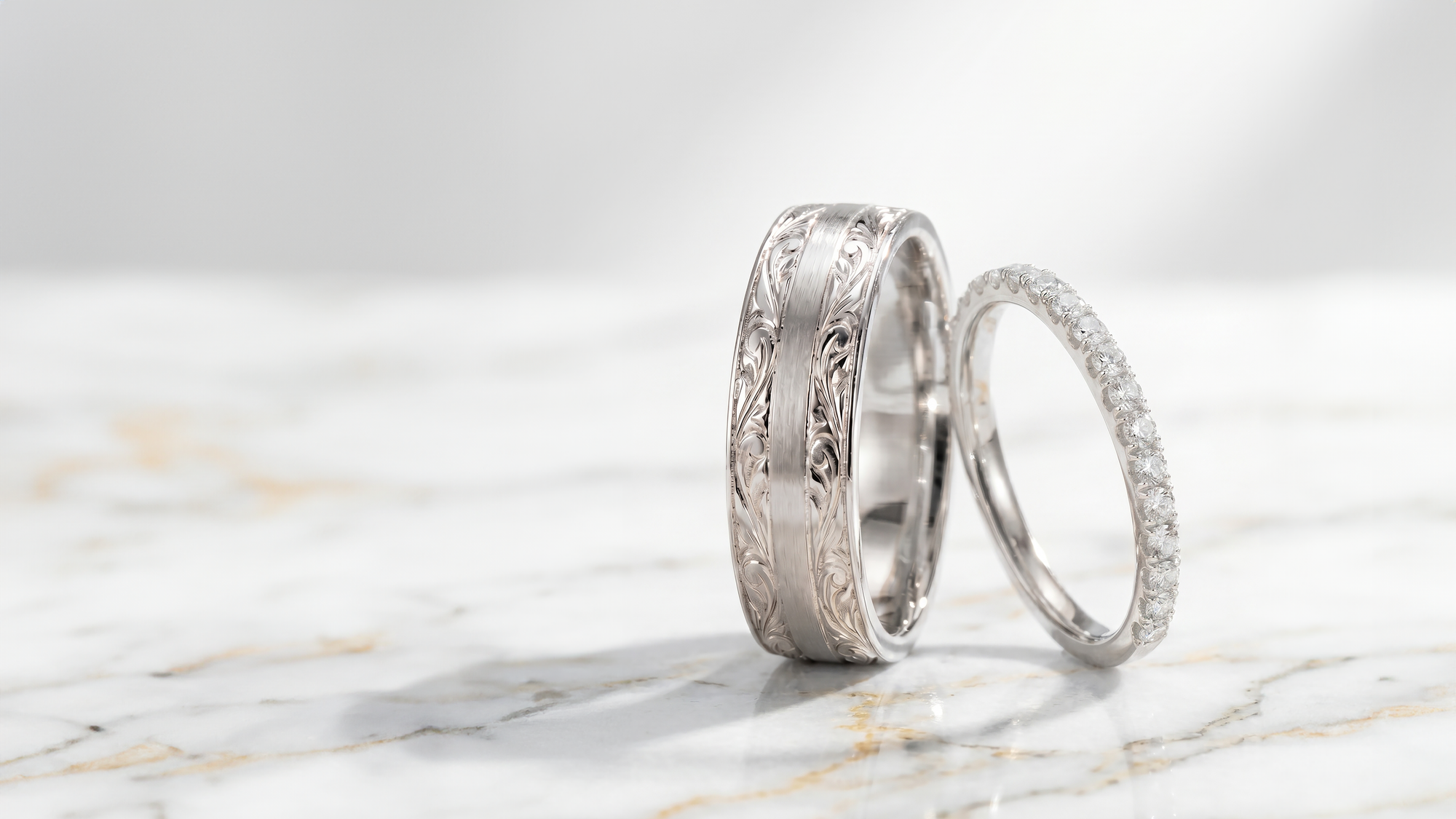 The Custom "Artisan" Wedding Bands: Intricate Engraving Meets a Diamond Eternity Silhouette