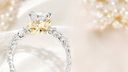 Love, tied with a golden bow - Doree diamond engagement Ring