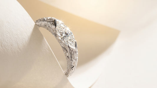 The Bespoke Engagement Ring Commission: An Integrated Marquise Solitaire with Artisanal Hand-Engraved Scrollwork
