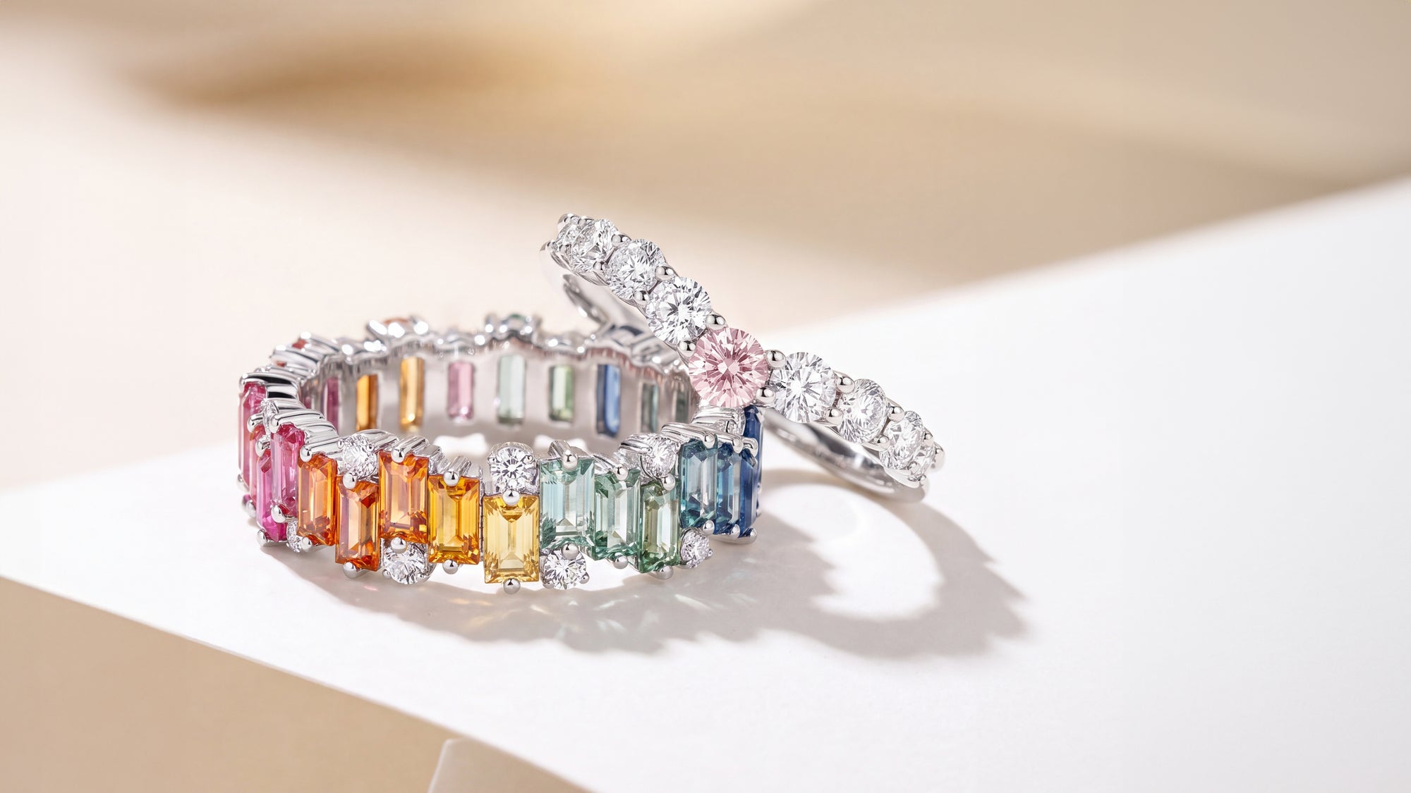 Title: A Vibrant Harmony: The Custom Multi-Colored Sapphire and Pink Diamond Wedding Suite