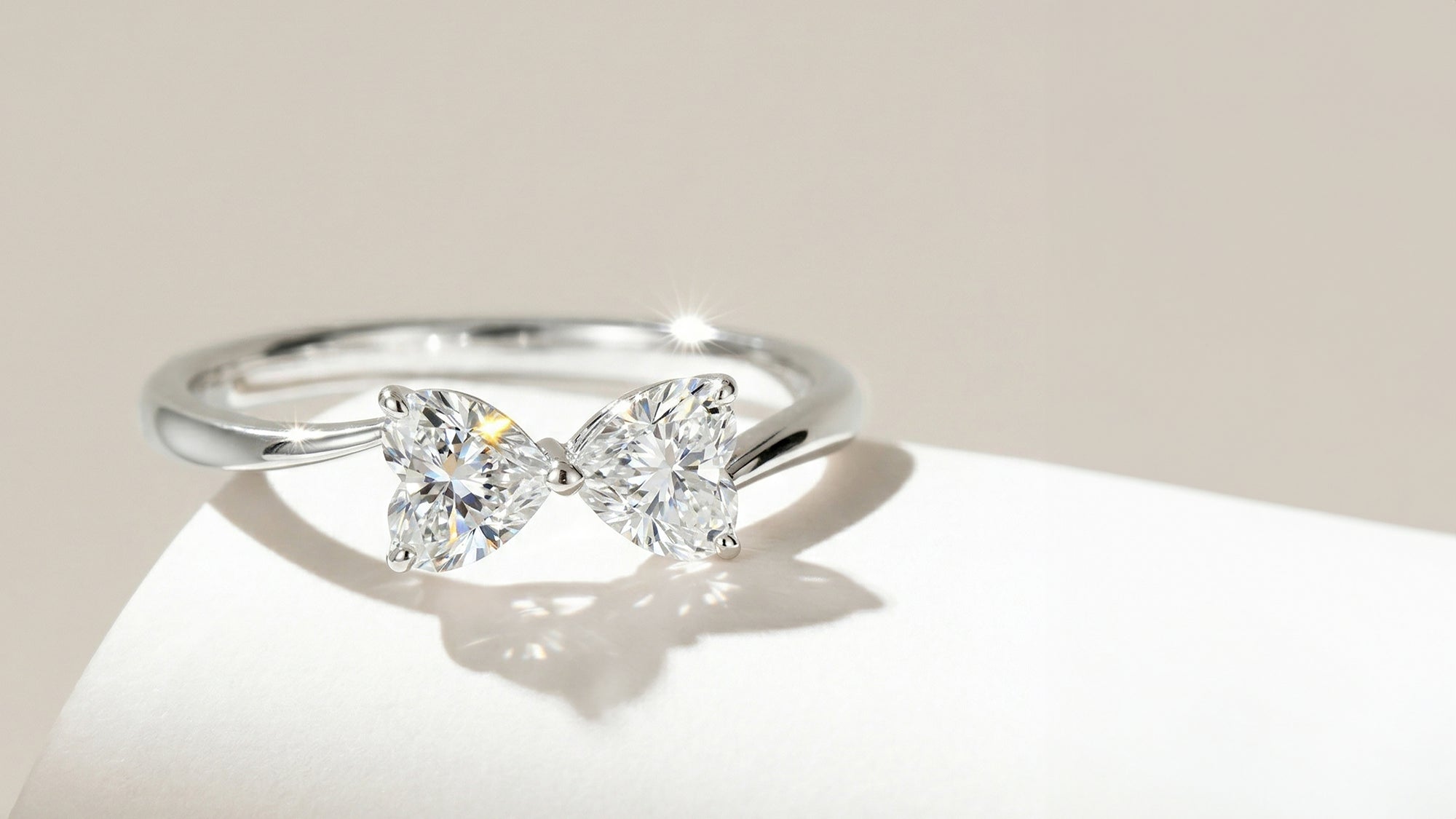 The Bespoke Ribbon Commission: A Dual Heart-Shaped Diamond Bow Engagement Ring