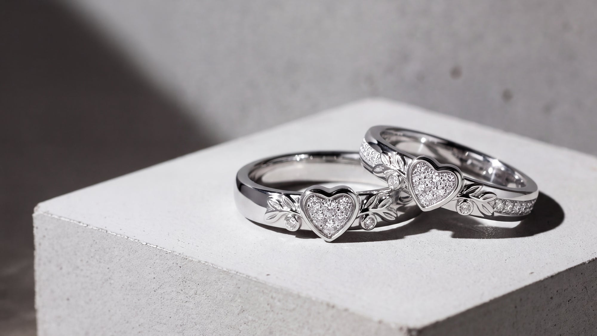A Shared Romance: The Custom Diamond Heart and Botanical Wedding Band Suite