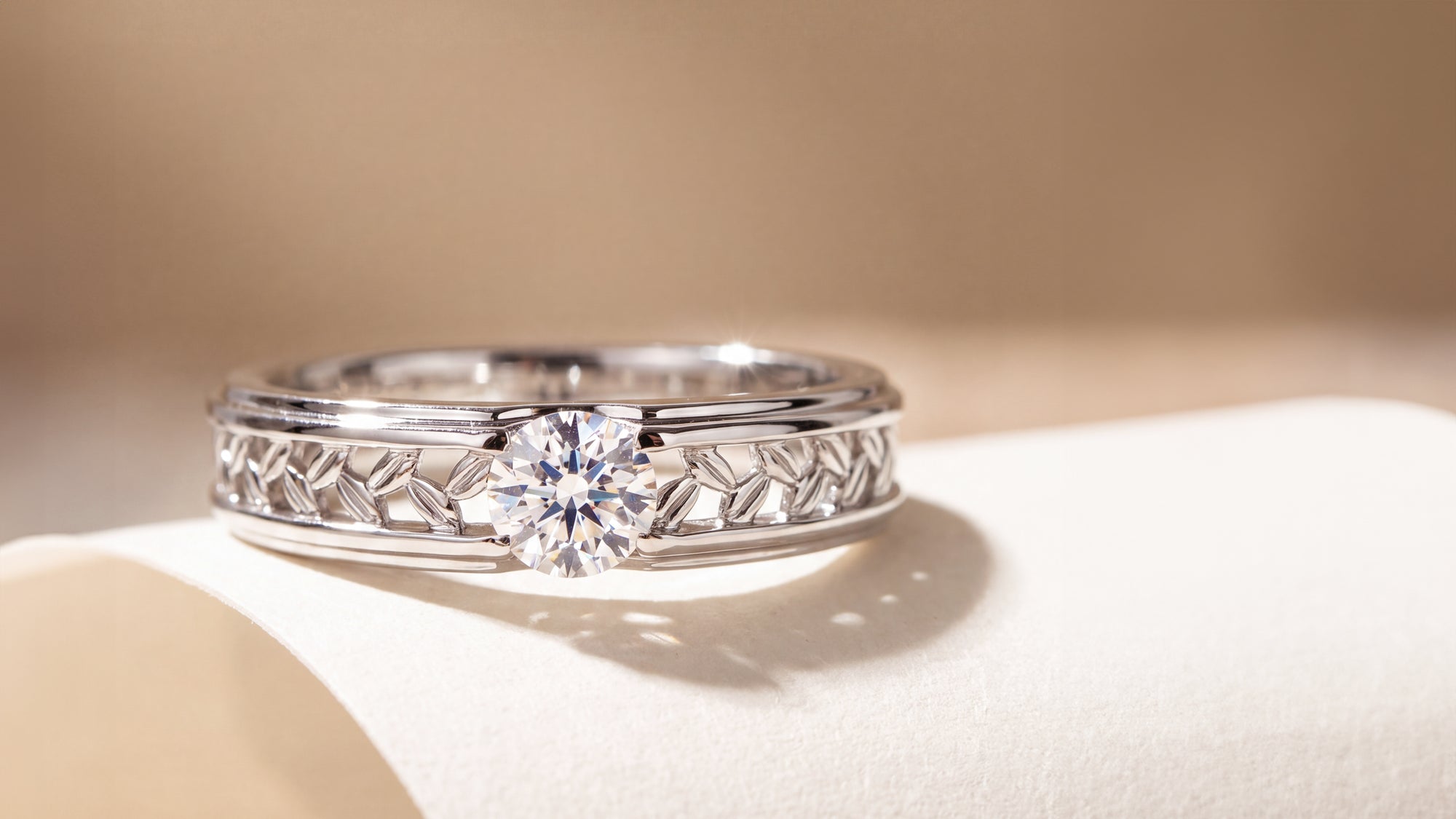 A Refined Strength: The Custom "Sylvan" Men's Solitaire and Botanical Openwork Band