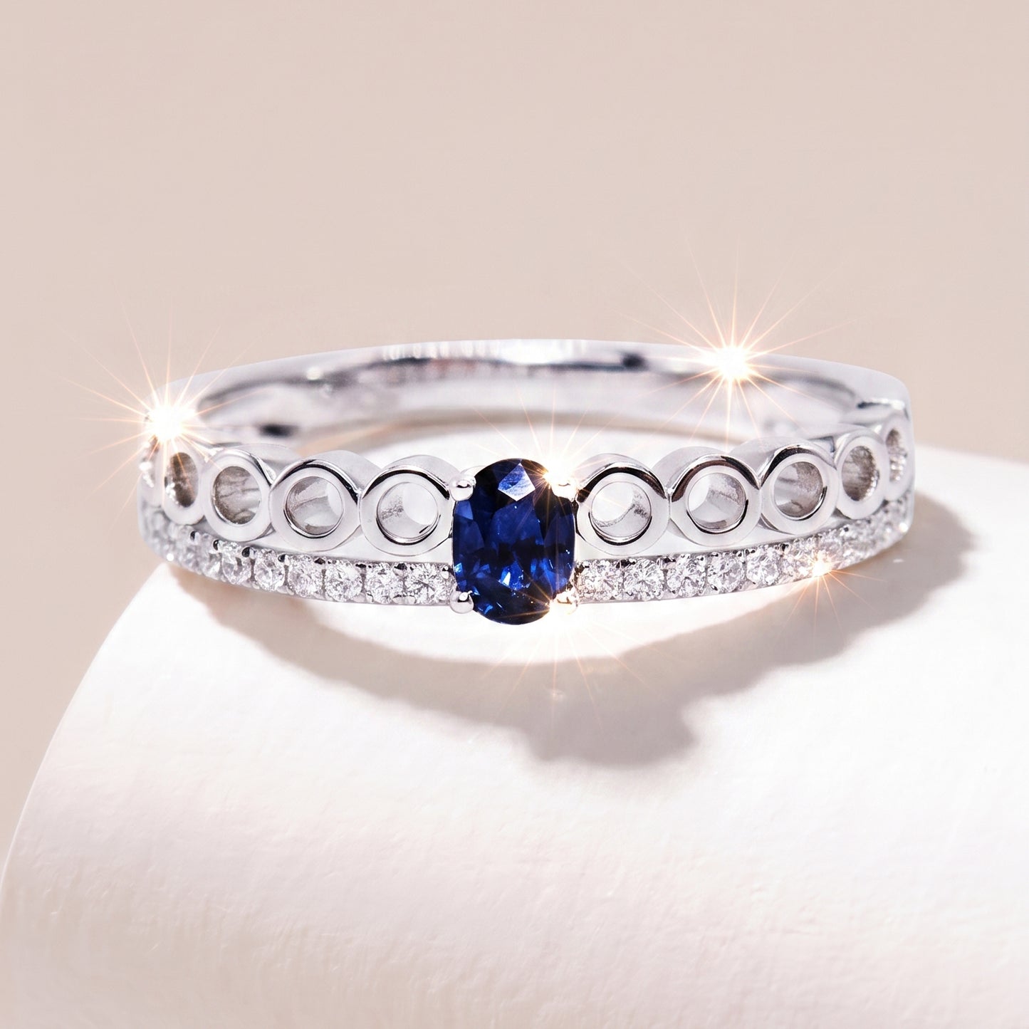 18 carat white-gold Signature Crown diamond ring with Sapphire