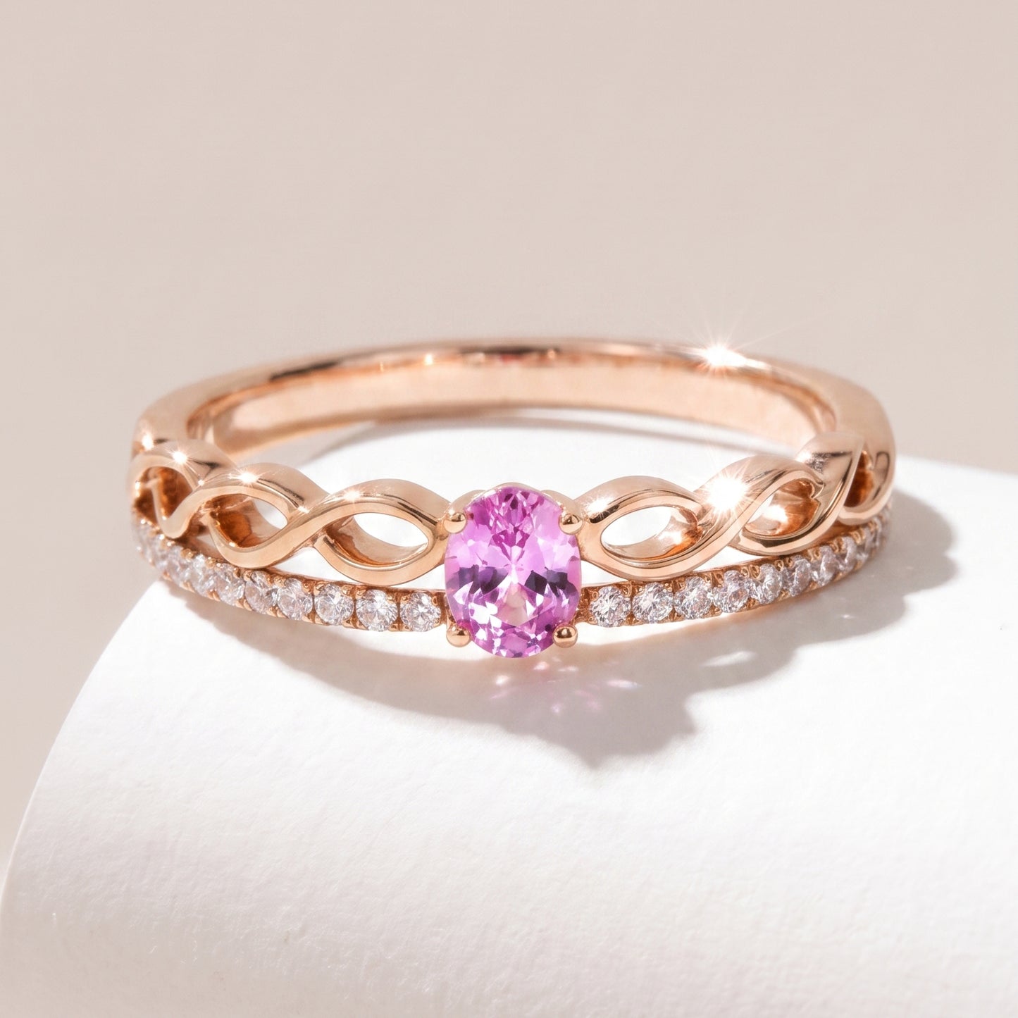18 carat rose-gold Signature Crown diamond ring with pink sapphire