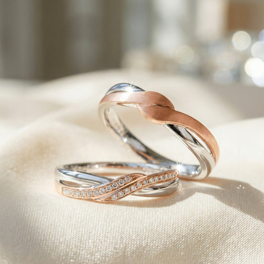 18 carat white w/ rose gold Signature Embrace wedding band set