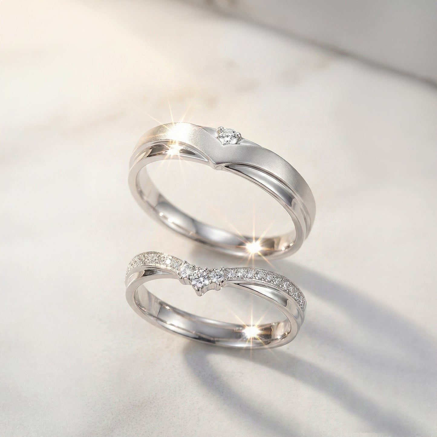 18 carat white gold Signature "Libre" wedding band set