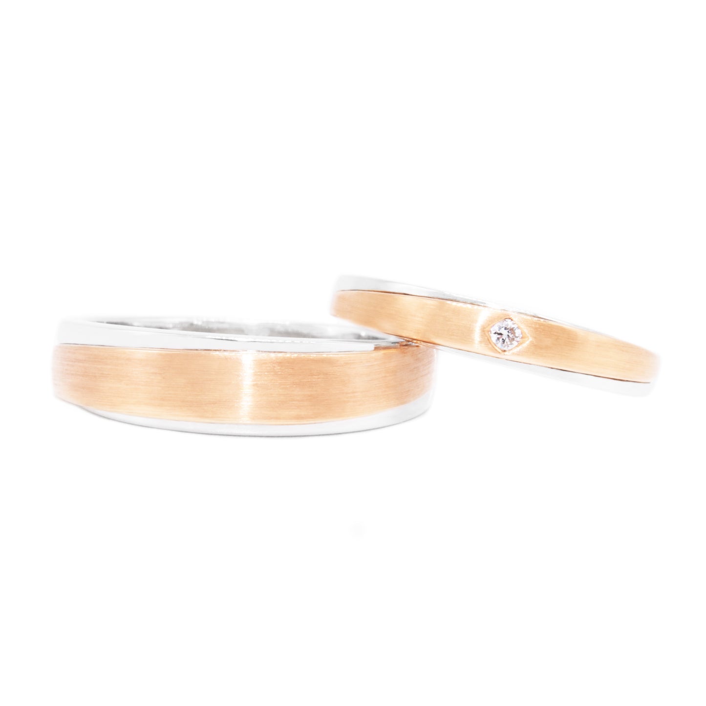 18 carat rose & white gold wavy wedding band set