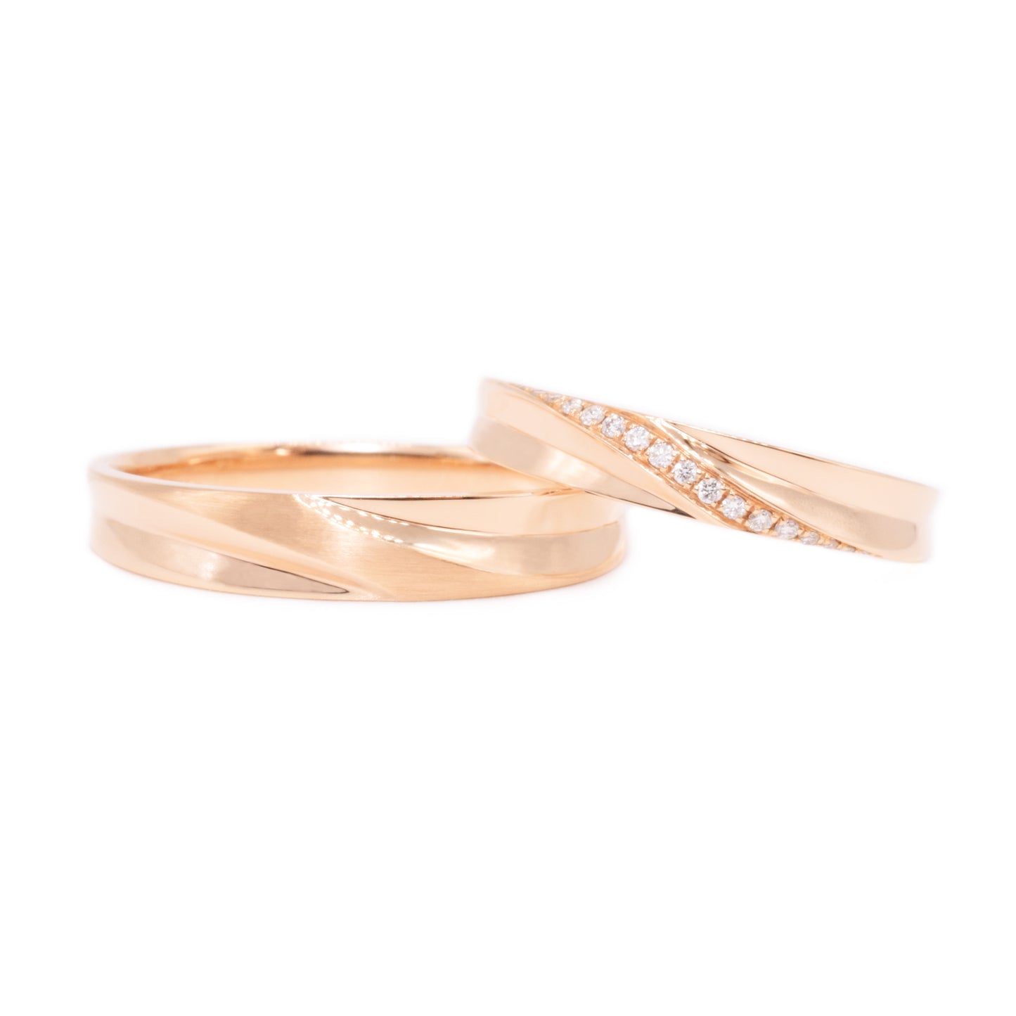 18 carat rose-gold sculpted wedding band set