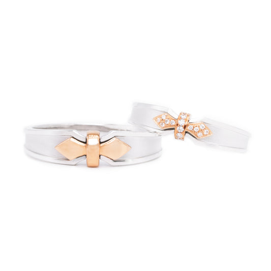 18 carat rose-gold w/ white gold Signature "Winsome" wedding band set